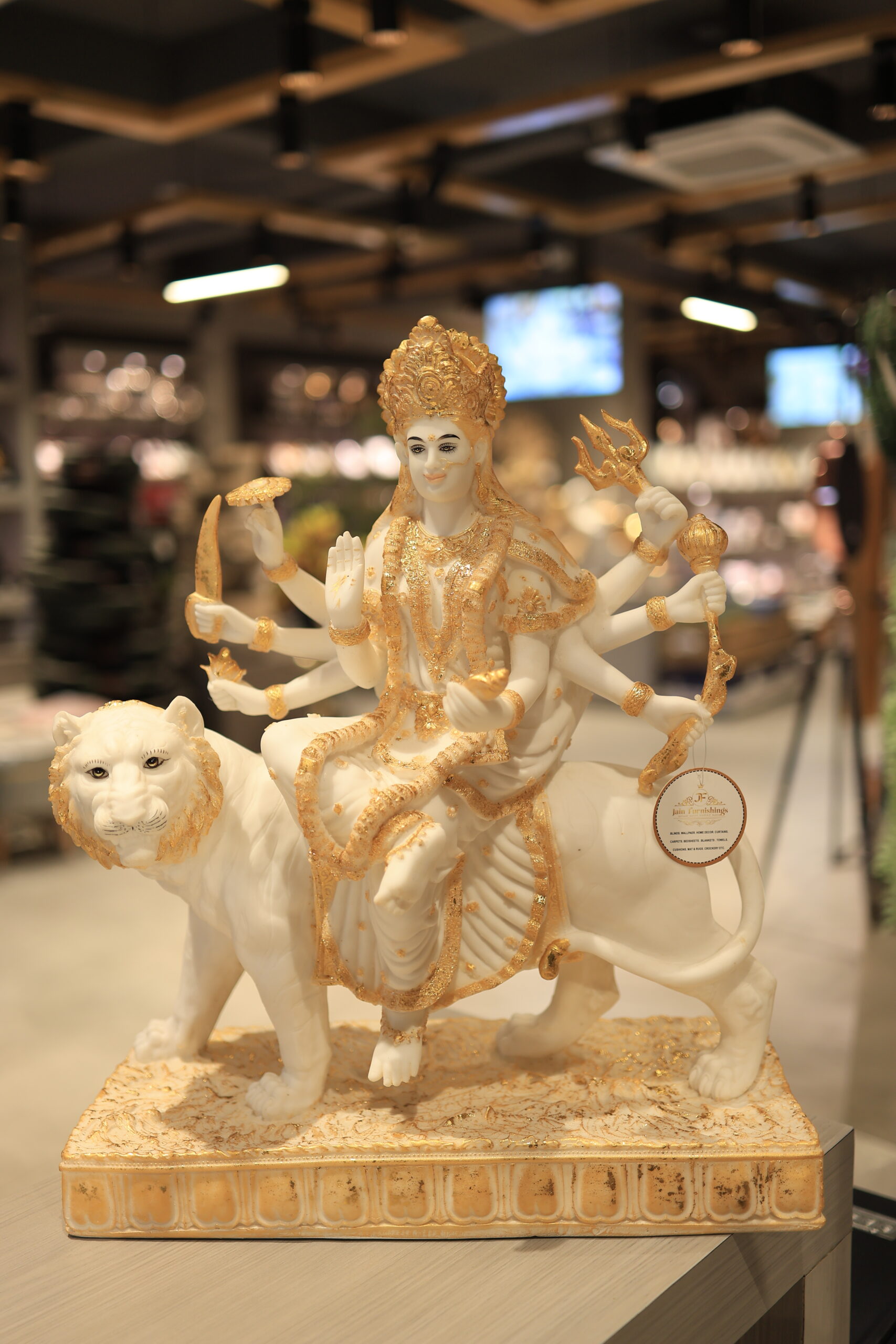 Divine Goddess Durga on Lion with Weapons - Intricate Gold & White Idol by Jain Furnishings
